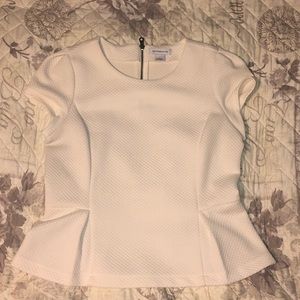 Cream peplum top. Size L